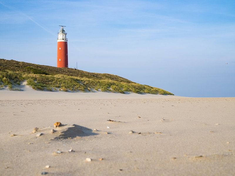 Lighthouse on the beach of Texel, Netherlands by Teun Janssen