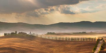 Sunrise over the mountains in Val D' Orcia by Marc de IJk
