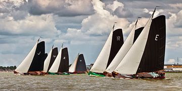 Race with traditional sailboats called Skutsjes by Frans Lemmens