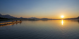 Sun-drenched tranquillity at Lake Hopfensee by Walter G. Allgöwer