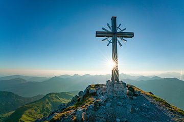 View of the Tannheim mountains with the summit cross from gaishorn by Leo Schindzielorz