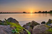 Sunset by the water