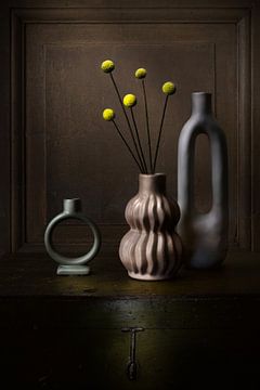 Modern still life of vases with yellow drumsticks by Silvia Thiel