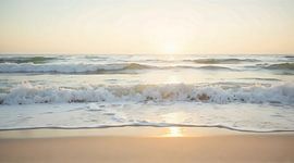 Soft Pastel Ocean Waves at Sunrise Beach by GabruPawPixels