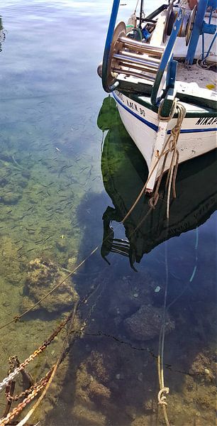 Boat and clear water by Caroline Kalkhoven