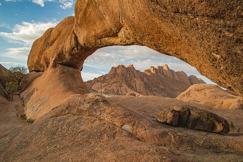Stone gate - rock arch in the Namibian desert