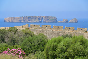 The castle walls of Neokastro, looking out over the sea towards the island of Sphakteria near Pylos