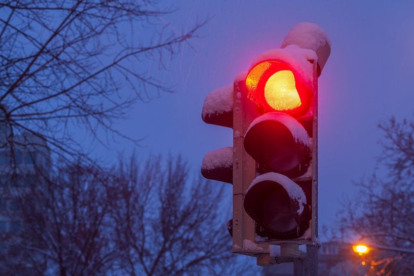 Snowy traffic light at dusk, Bremen, Germany, Europe by Torsten Krüger