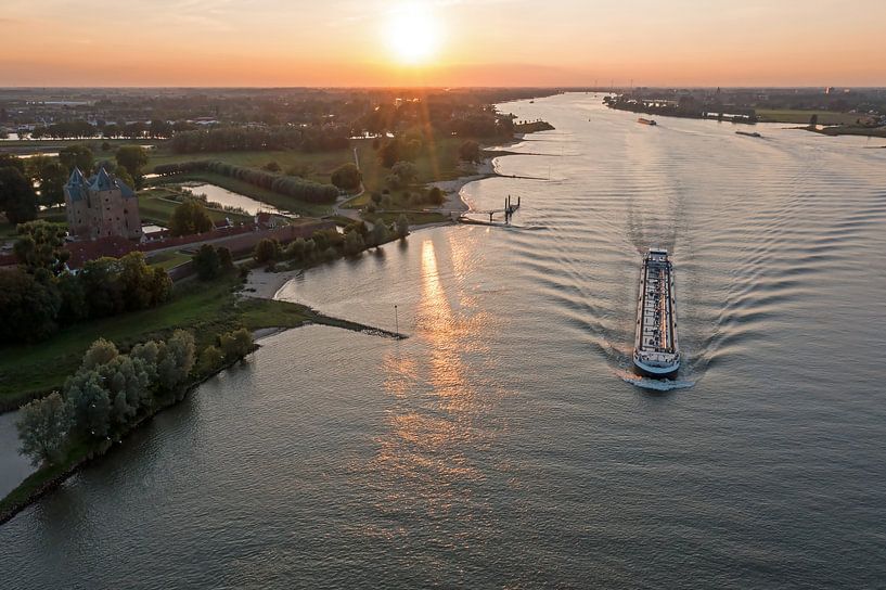 Aerial view of Loevestein Castle and the river Merwede at sunset by Eye on You