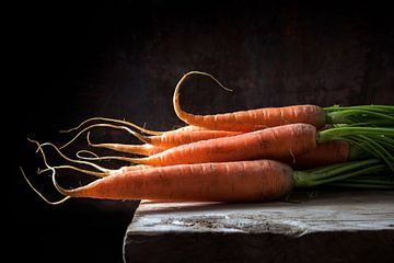 Carrots with green leaves on a rustic wooden table against a dark background with copy space, backli by Maren Winter