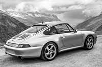 Porsche 911 sports car in the Alps