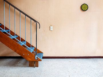 Late room with blue stairs and dartboard by Pascale Drent