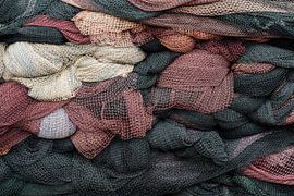 Stack of fishing nets by Daan Kloeg