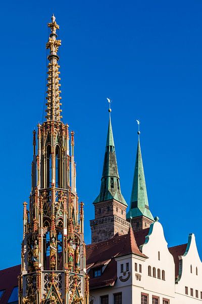 Beautiful fountain and the church St. Sebald in Nuremberg by Werner Dieterich