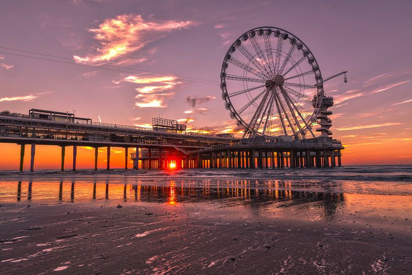 Sunset at the pier of Scheveningen by René Rollema
