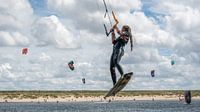 Sportswoman in action, kitesurfing