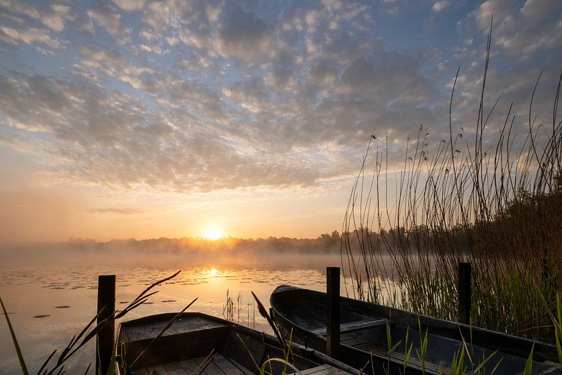 Sunrise with rowing boats by Manja van der Heijden