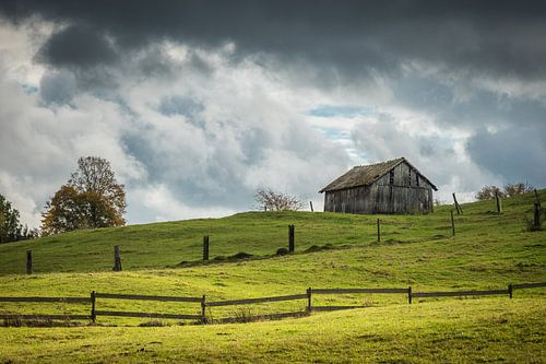 Landschap met veldschuur