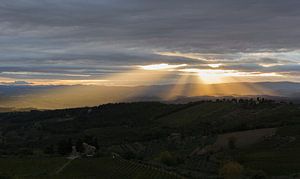 Sun through the clouds in Tuscany Landscape