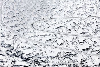 Aerial view of skaters enjoying winter fun on the Loosdrecht Lakes –
