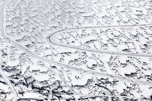 Aerial view of skaters enjoying winter fun on the Loosdrecht Lakes –