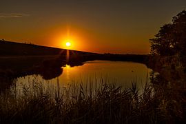 Wattenmeer, Sonnenaufgang am Paesens Moddergat vor dem Deich