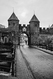 Passer-by under the Koppelpoort in Amersfoort by Amersfoort Fotoprint