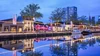 Pius harbor with yachts, cafes and terraces at twilight 