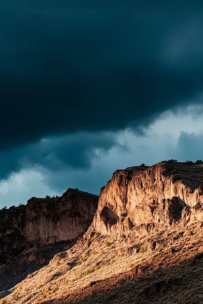 Dramatic rocky landscape under clouds by Poster Art Shop