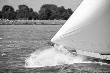 Skutsje classic sailboat sailing on the IJsselmeer 