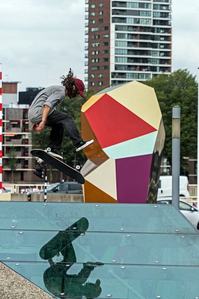 Skateboarder in the entrance Garage by leon elias