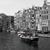 Nederlandse vlag in de Prinsengracht in Amsterdam van Pascal Lemlijn