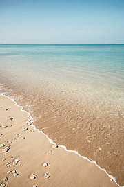 Turquoise sea on a tropical beach by Troy Wegman