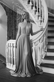 Beautiful woman in front of stairs in a canal house 2 by PH-otographer