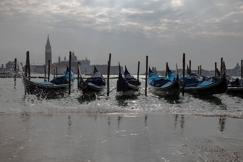 Gondolas in Venice at rising waterlevel by STEVEN VAN DER GEEST