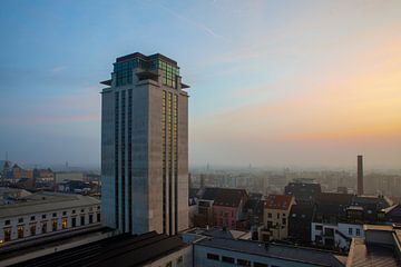 Sunrise with Ghent's book tower by Marcel Derweduwen