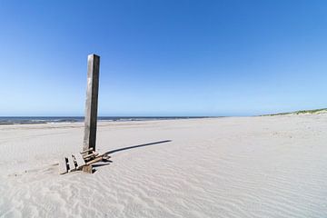 Beach post on the deserted beach of Groet in Noord-Holland Netherlands by Paul Veen