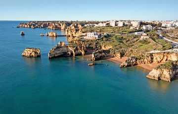 Aerial view of natural rocks near Lagos in Algarve Portugal by Eye on You