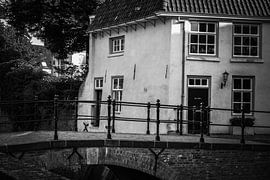 Little white house at the canal by Charles van den Reek
