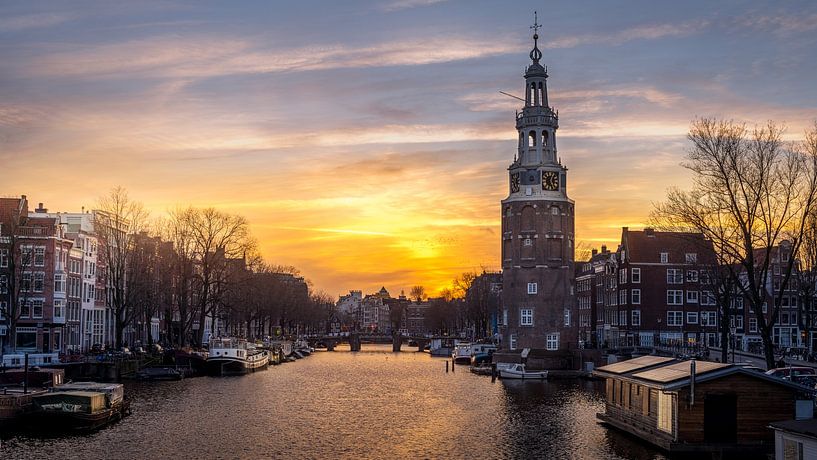 Die Montelbaanstoren in Amsterdam während des Sonnenuntergangs von Bart Ros