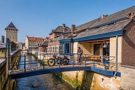 Biker on the bridge. by Dutch Zappie