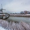Le moulin de Hensbroeker dans la neige sur peterheinspictures