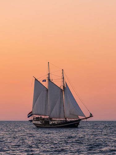 Sailing ship in the sunset at the Hanse Sail in Rostock
