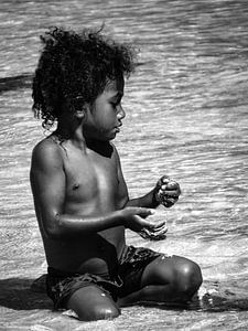 Playing with sand at the beach