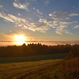 A sunrise on an autumn morning by Claude Laprise