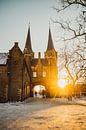 Winters Oostpoort van Paul Schlüter thumbnail