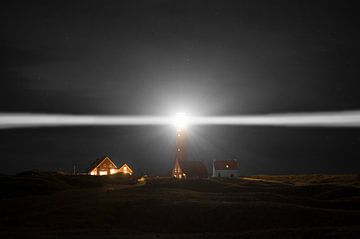 A Lighthouse at Night on Texel van Brian Morgan