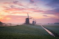 Spectaculaire zonsopkomst met drie molens van iPics Photography thumbnail
