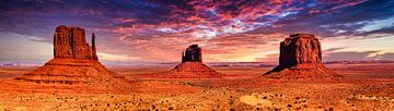 Panorama mesa monoliths in Monument Valley in tah USA with clouds and sunset by Dieter Walther