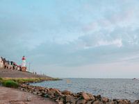 The Dutch lighthouse in Urk around sunset with the IJsselmeer